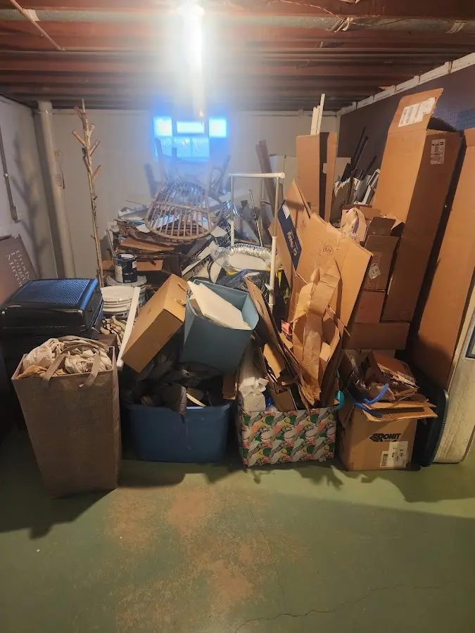 Roll-off dumpster container at job site for Yard Waste Dumpster Rental in South Haven